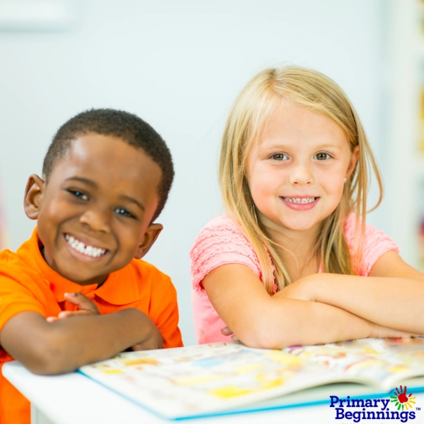 Preschoolers are reading a book for Dr. Seuss Day