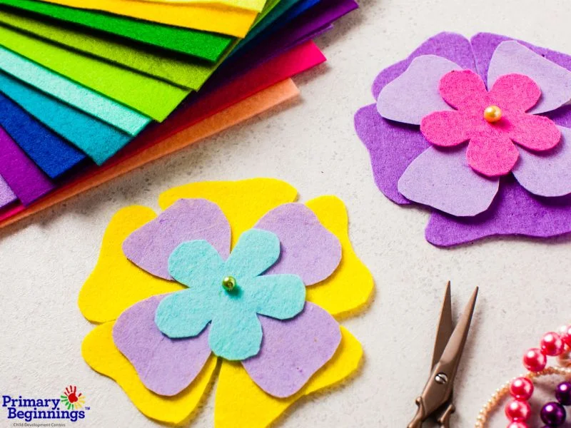 Felt fabric cut out in the shape of flowers for the blog post titled, "Easter Activities for Toddlers."