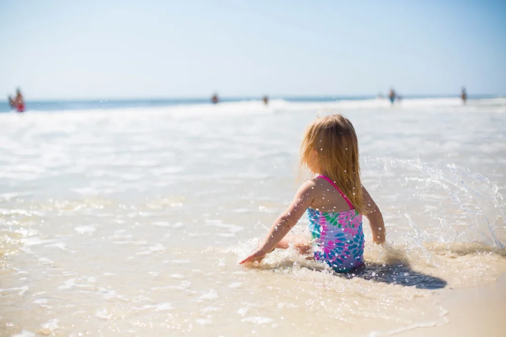 Sports activities for preschoolers includes a child swimming, as pictured here. 