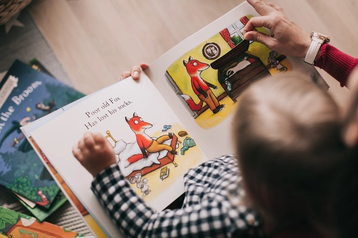 preschool in raleigh - child reading a book