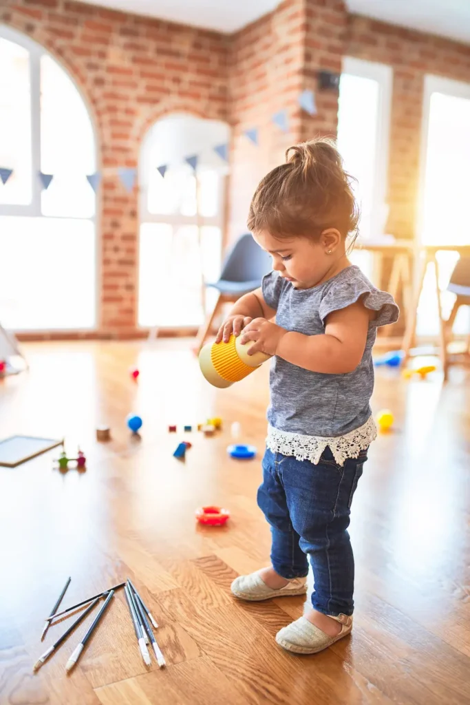 Preschooler doing an activity to promote cognitive development 